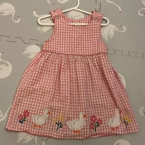 Pink gingham dress with duck detail